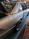Beige Mercedes R129 delebil thumbnail